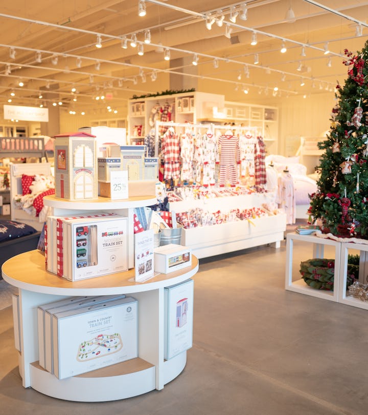 Interior image of a Pottery Barn Kids retail store decorated for the Christmas.