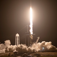 CAPE CANAVERAL, FLORIDA - NOVEMBER 10: SpaceX Falcon 9 rocket with the Crew Dragon spacecraft lifts ...