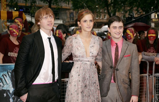 Rupert Grint (left), Emma Watson and Daniel Radcliffe (right) arriving for the world premiere of Har...
