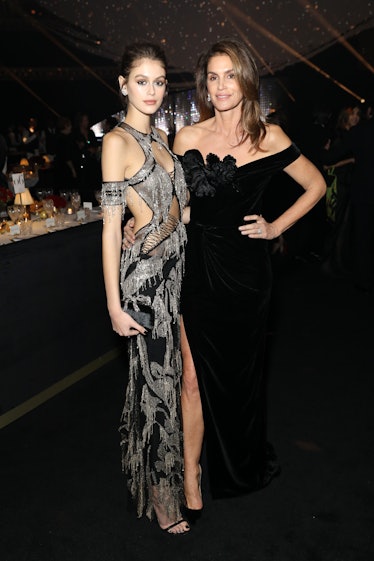 Kaia Gerber (L) and Cindy Crawford during pre-ceremony drinks at The Fashion Awards 2018