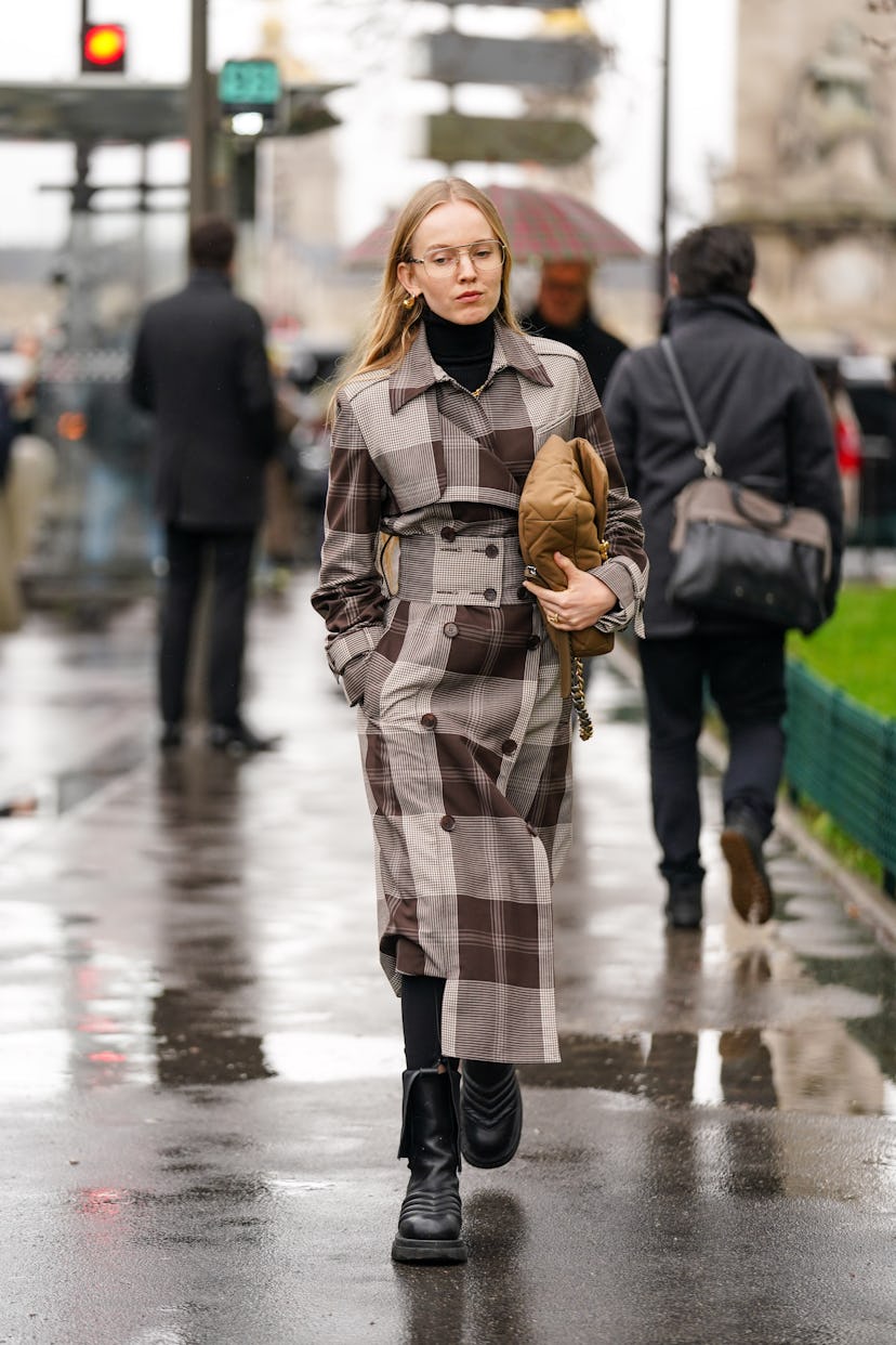 alexandra carl in a brown coat