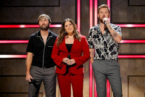 NASHVILLE, TENNESSEE - OCTOBER 13: (L-R) Dave Haywood, Hillary Scott and Charles Kelley of Lady A sp...