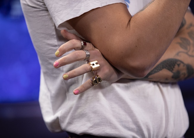 Fashion detail of Harry Styles nails and rings, mentioned on air while backstage in the on air studi...