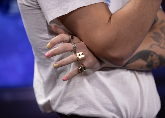 Fashion detail of Harry Styles nails and rings, mentioned on air while backstage in the on air studi...