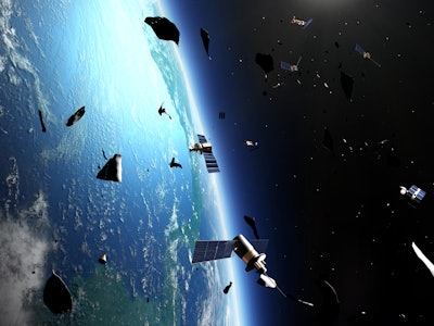 Illustration of space junk around Earth. Space junk consist of debris left in orbit from space missi...