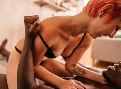 This new couple is exploring BDSM, including submission, in bed. 