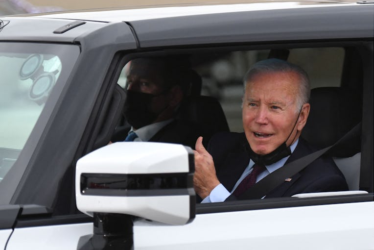 US President Joe Biden test drives an electric hummer as he tours the General Motors Factory ZERO el...