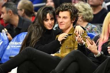 LOS ANGELES, CALIFORNIA - NOVEMBER 11: Camila Cabello and Shawn Mendes attend a basketball game betw...