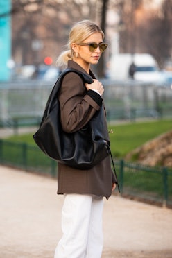 Caroline Daur with a hobo bag