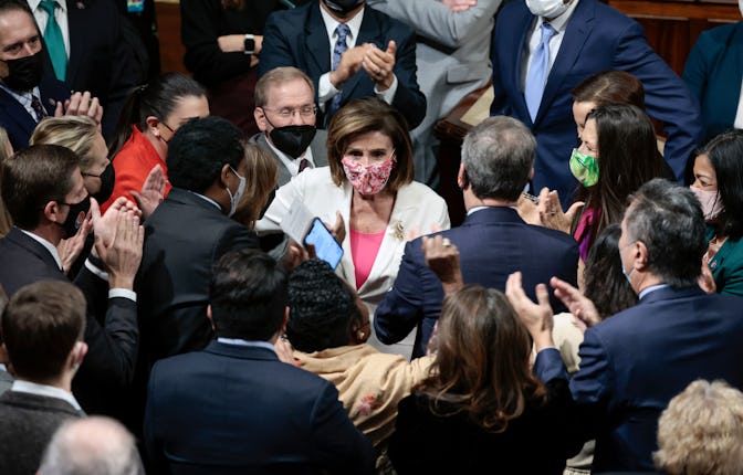 WASHINGTON, DC - NOVEMBER 19: Speaker of the House Nancy Pelosi (D-CA) is surrounded by fellow House...
