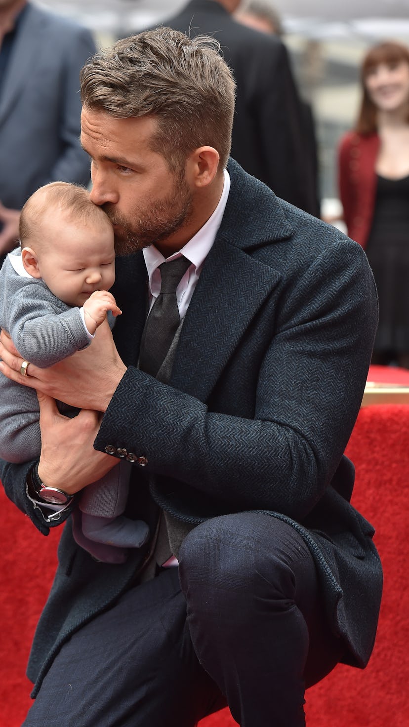 HOLLYWOOD, CA - DECEMBER 15: Actor Ryan Reynolds and daughter Ines Reynolds attend the ceremony hon...
