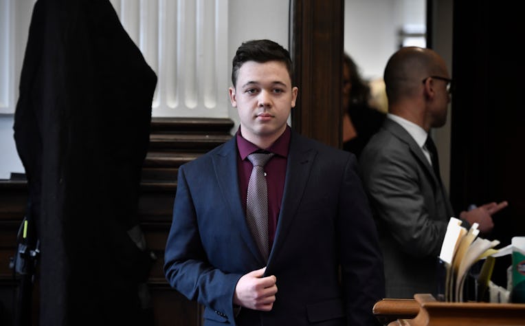 KENOSHA, WISCONSIN - NOVEMBER 19: Kyle Rittenhouse enters the courtroom to hear the verdicts in his...