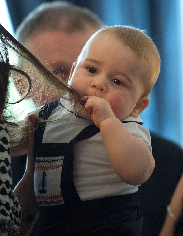 Prince George loves his mom's hair.