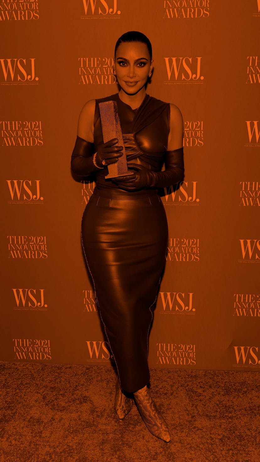 NEW YORK, NEW YORK - NOVEMBER 01: Kim Kardashian West poses with an award during the WSJ. Magazine 2...