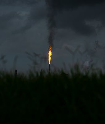 NORCO, LA - AUGUST 21: A gas flare from the Shell Chemical LP petroleum refinery illuminates the sky...
