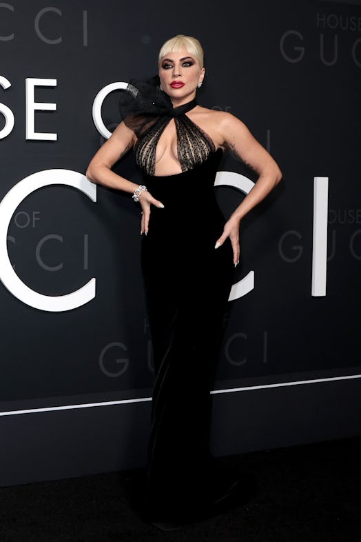 Lady Gaga wears Giorgio Armani Privé velvet halter gown in 2021.