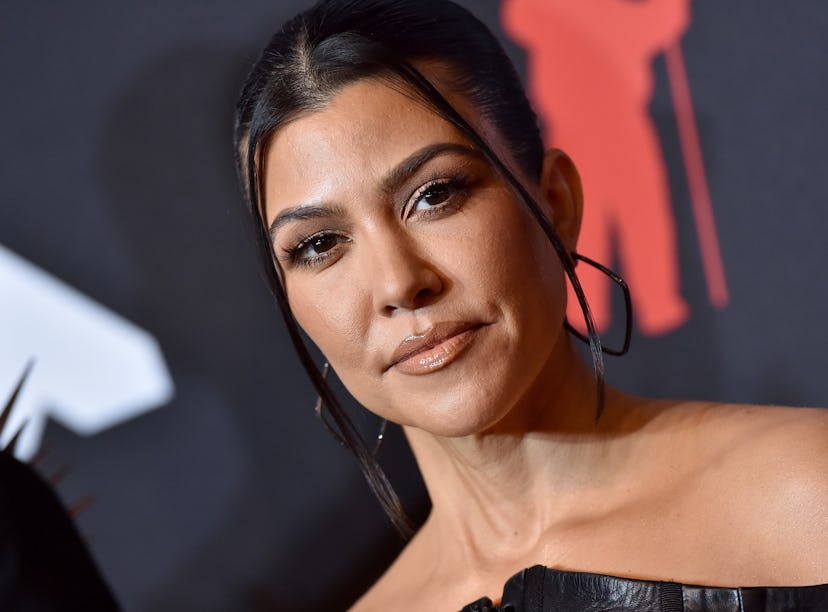 Kourtney Kardashian responded to an Instagram commenter who criticized her for not posting as many p...