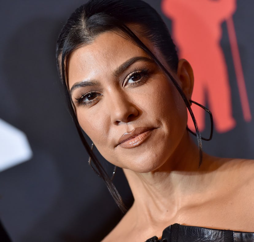 Kourtney Kardashian responded to an Instagram commenter who criticized her for not posting as many p...