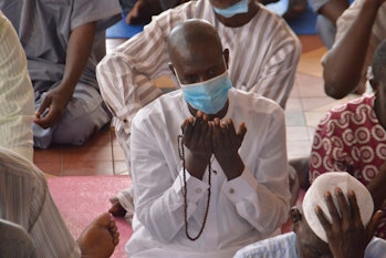 Muslim devotees pray on the first Friday of the holy fasting month of Ramadan, at the Lagos Island C...