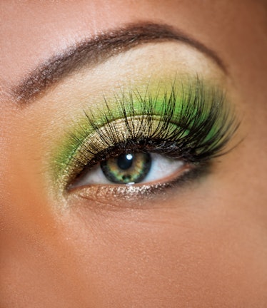 A close up of halo-style, green eyeshadow.