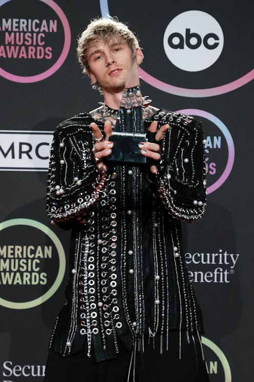LOS ANGELES, CALIFORNIA - NOVEMBER 21: Machine Gun Kelly, winner of the Favorite Rock Artist award, ...
