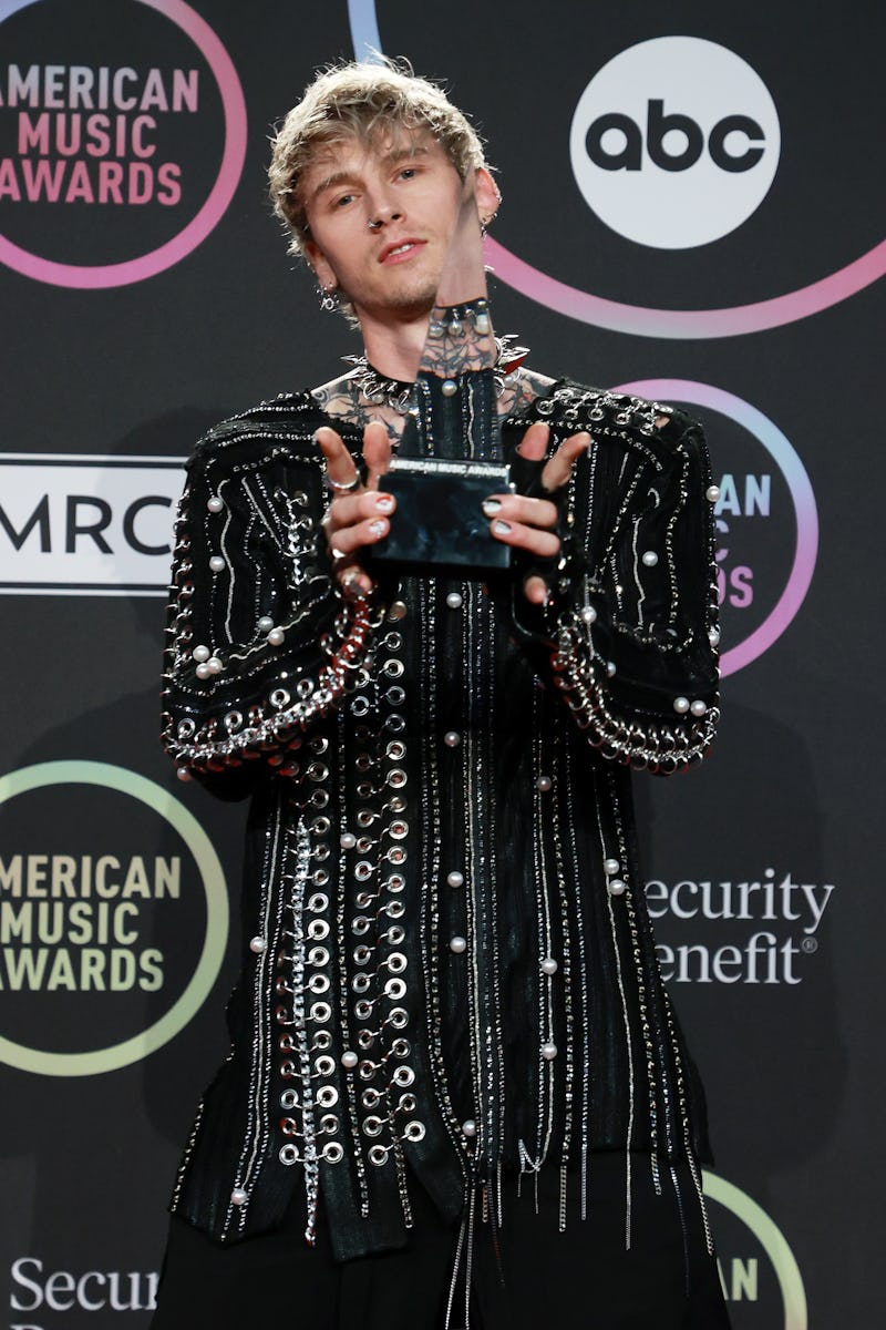 LOS ANGELES, CALIFORNIA - NOVEMBER 21: Machine Gun Kelly, winner of the Favorite Rock Artist award, ...