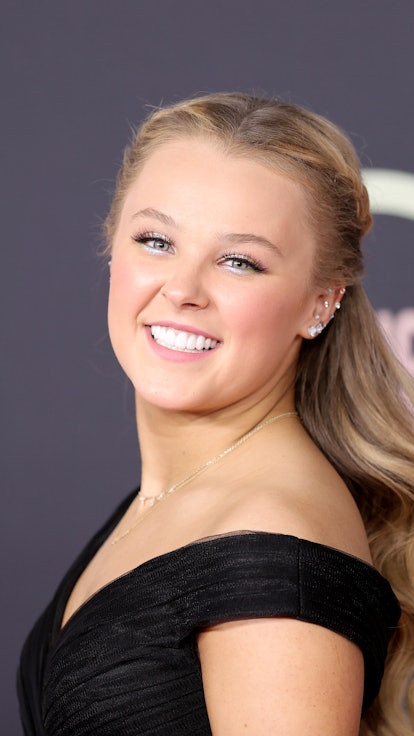 Instead of rocking her signature ponytail, JoJo Siwa wore her hair down at the 2021 American Music A...