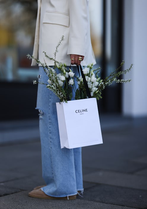 HAMBURG, GERMANY - APRIL 16: Elise Soho wearing beige Closed shoes, blue destroyed Zara jeans, Celin...