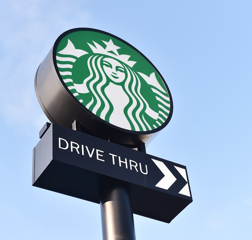 STOKE-ON-TRENT- NOVEMBER 13: The American Coffeehouse ccompany, Starbucks logo is seen outside one ...