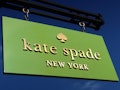 CENTRAL VALLEY, NY - NOVEMBER 24: A Kate Spade sign hangs in front of their store at the Woodbury Co...