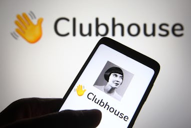 UKRAINE - 2021/05/10: In this photo illustration the Clubhouse logo is seen on a smartphone and a pc...