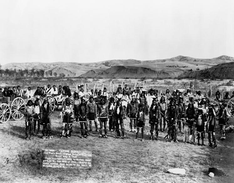 A group portrait of Big Foot's Miniconjou Sioux band at a Grass Dance on the Cheyenne River, South D...
