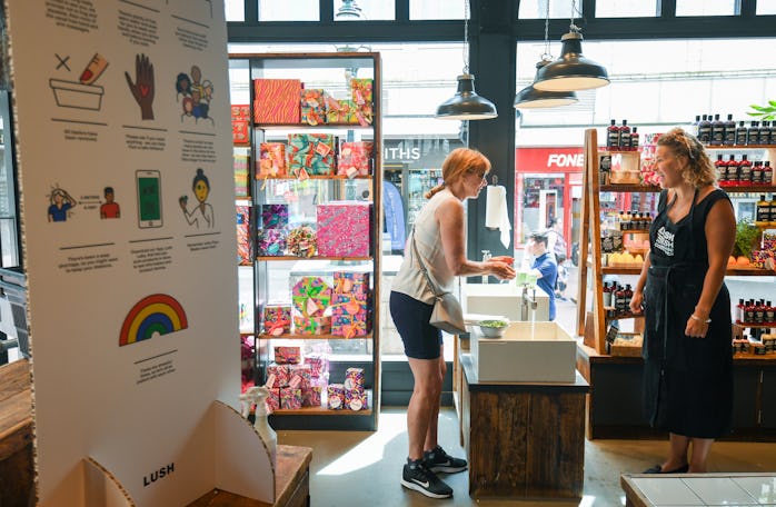 BOURNEMOUTH, ENGLAND - JUNE 15: People are asked to wash their hands when entering the shop 'Lush' i...