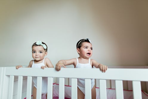 Two babies play in a crib. The rarest baby names in the U.S., according to the most recent data, inc...