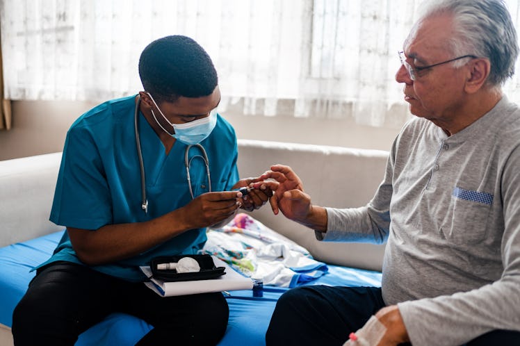 District male nurse at home visit