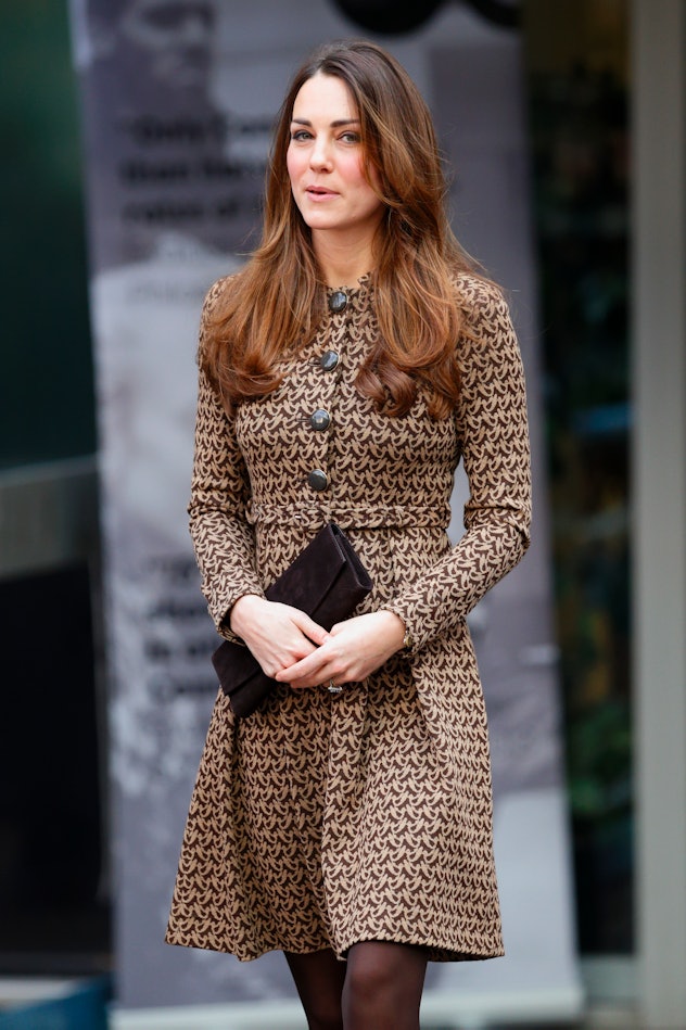 Kate Middleton wore a tweed dress coat.