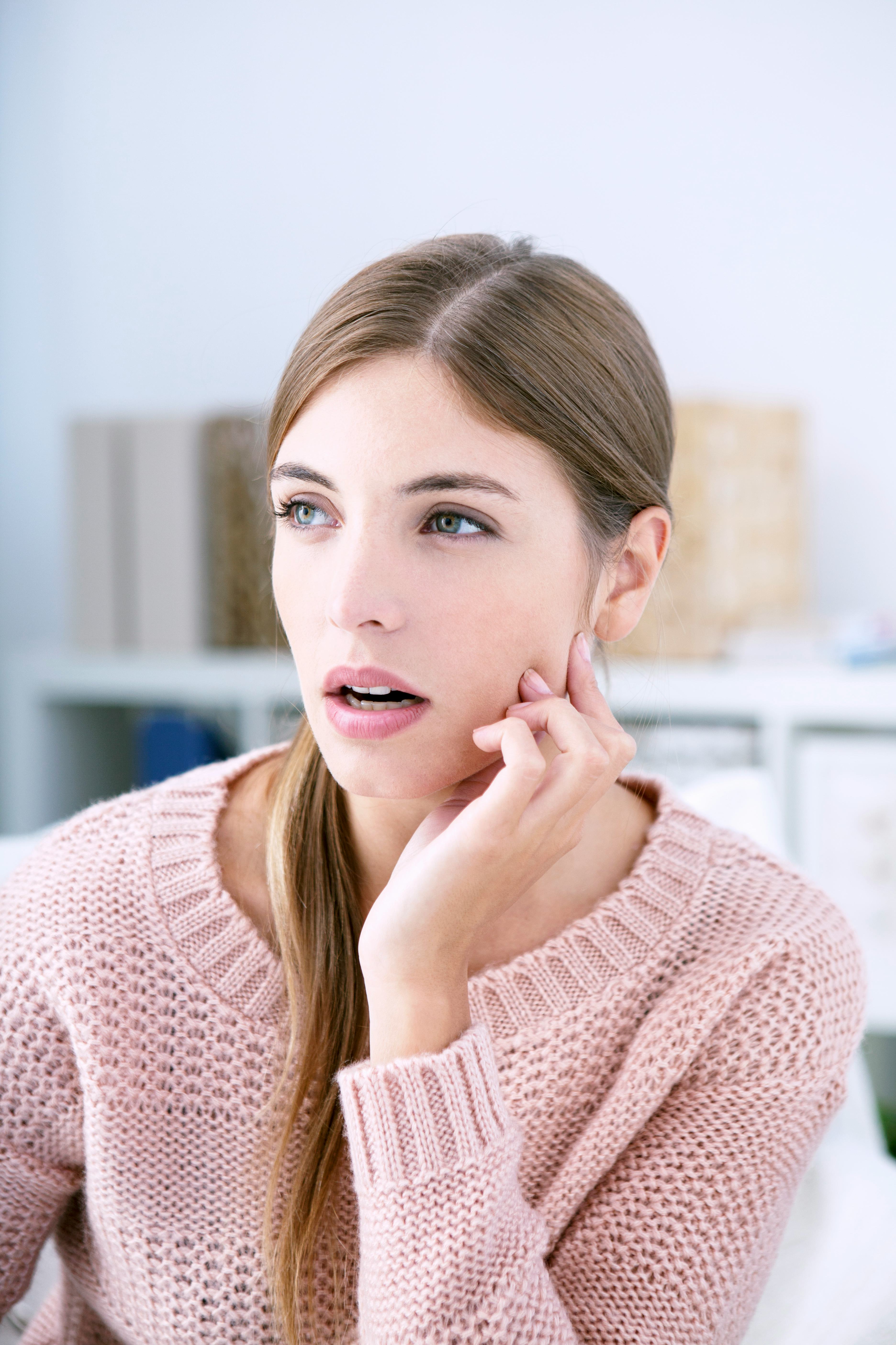 Find jaw stretches to alleviate TMJ pain.
