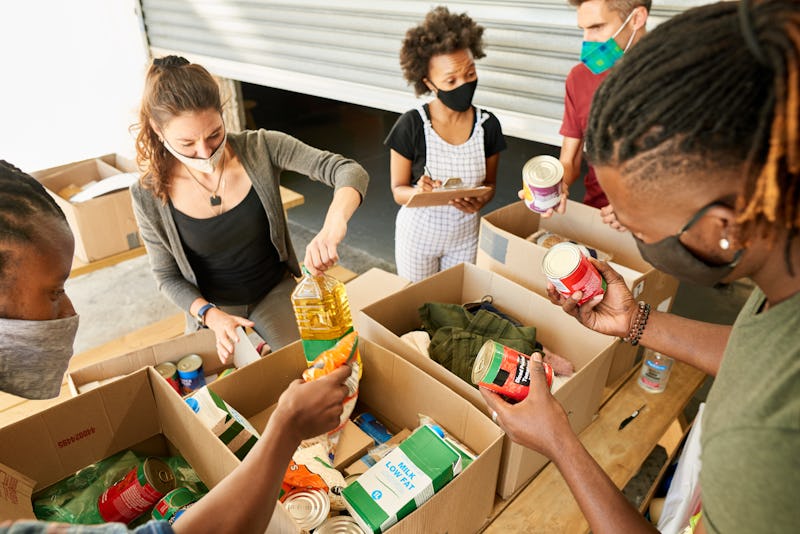 A group of millennials volunteer. Here's your daily horoscope for November 29, 2021.