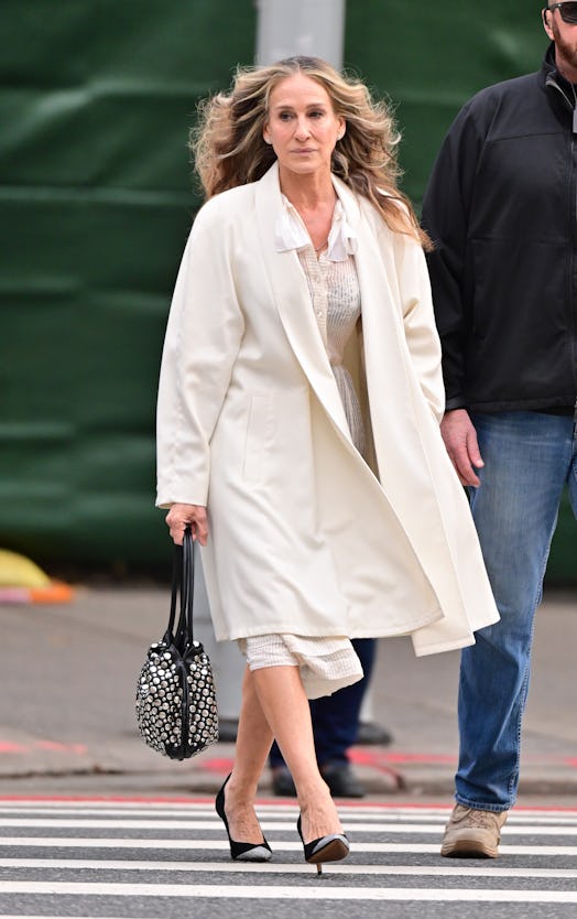 Sarah Jessica Parker wears Sonia Rykiel Domino Bag as Carrie Bradshaw in 2021.
