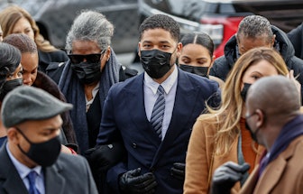 Jussie Smollett, center, arrives at the Leighton Criminal Court Building for the beginning of his tr...