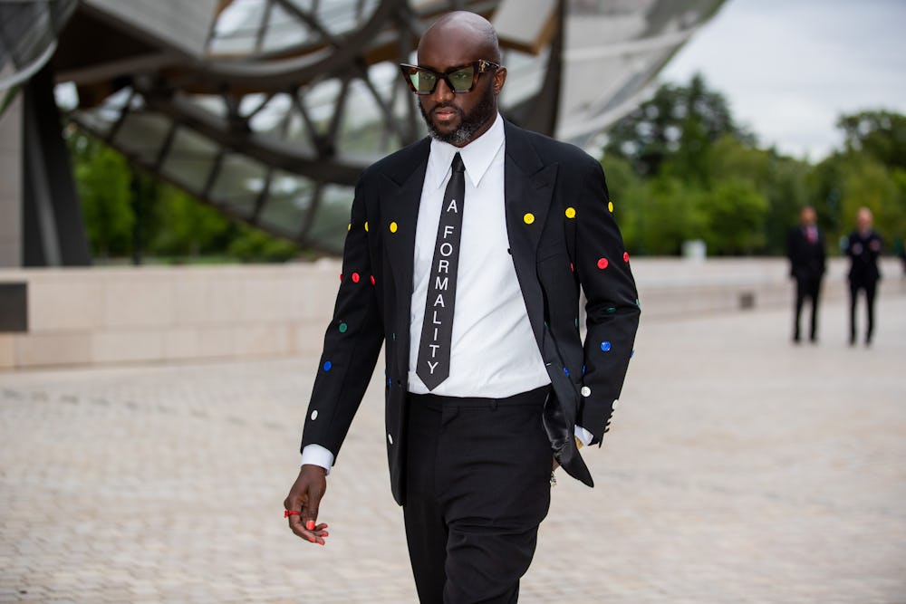 PARIS, FRANCE - JULY 05: Virgil Abloh is seen wearing tie and suit, white button shirt, sunglasses o...