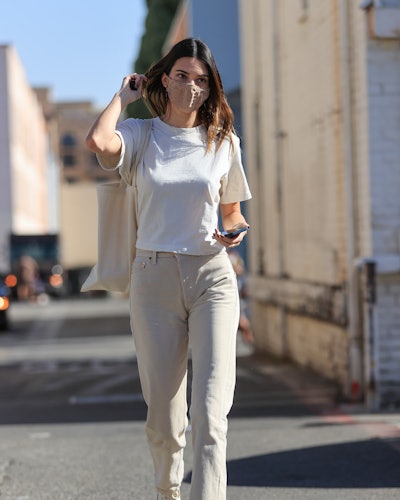 Kendall Jenner wears off-white jeans in 2021.