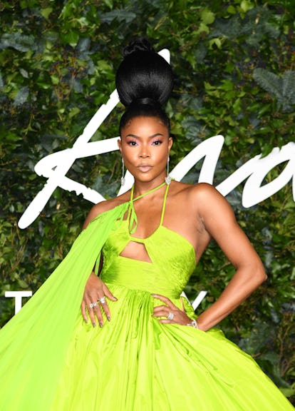 Gabrielle Union Stuns In Lime Green Caped Gown At The 21 Fashion Awards