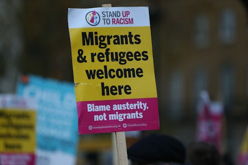 LONDON, UNITED KINGDOM - NOVEMBER 27: People gather outside 10 Downing Street during a protest after...