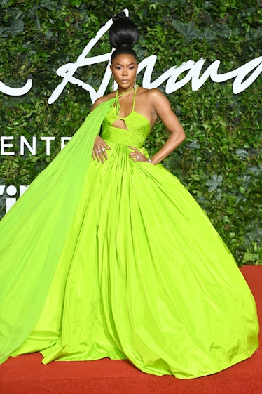 Gabrielle Union Stuns In Lime Green Caped Gown At The 21 Fashion Awards