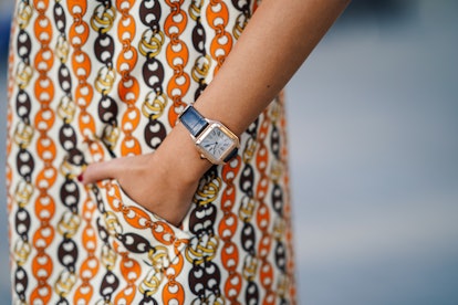 Noa Souffir wearing a Gucci dress and a Cartier watch