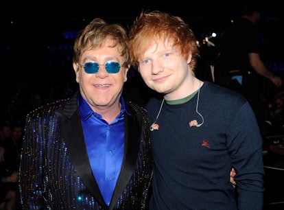 Ed Sheeran and Elton John announced their holiday single by recreating a scene from 'Love Actually.'...