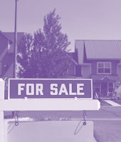 Summer Houses with a 'For Sale' sign in a small new neighborhood in Gunnison, Colorado 6/18/20 mid d...