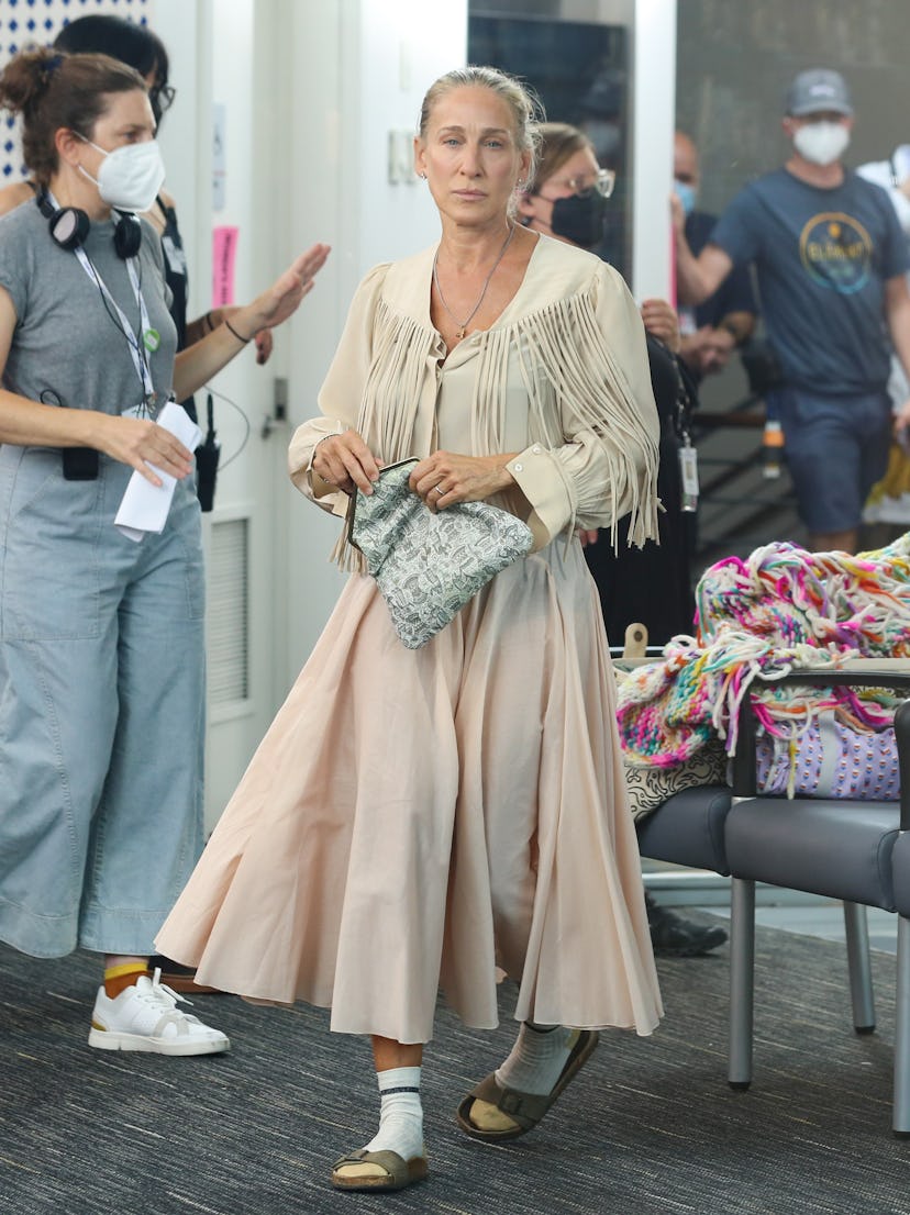 See Carrie Bradshaw’s outfits on ‘And Just Like That,’ from tutus to lehengas to overalls.