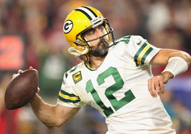 GLENDALE, ARIZONA - OCTOBER 28: Quarterback Aaron Rodgers #12 of the Green Bay Packers throws the fo...
